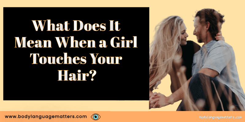Why Does She Look at Me and Touch Her Hair? Here's What It Could Mean